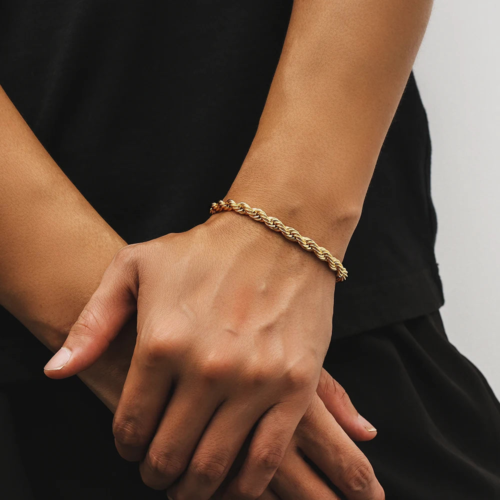 Men's model showcasing the Rope Bracelet in 18K Gold with 6MM links, emphasizing its elegant design and refined finish for a bold and luxurious statement.