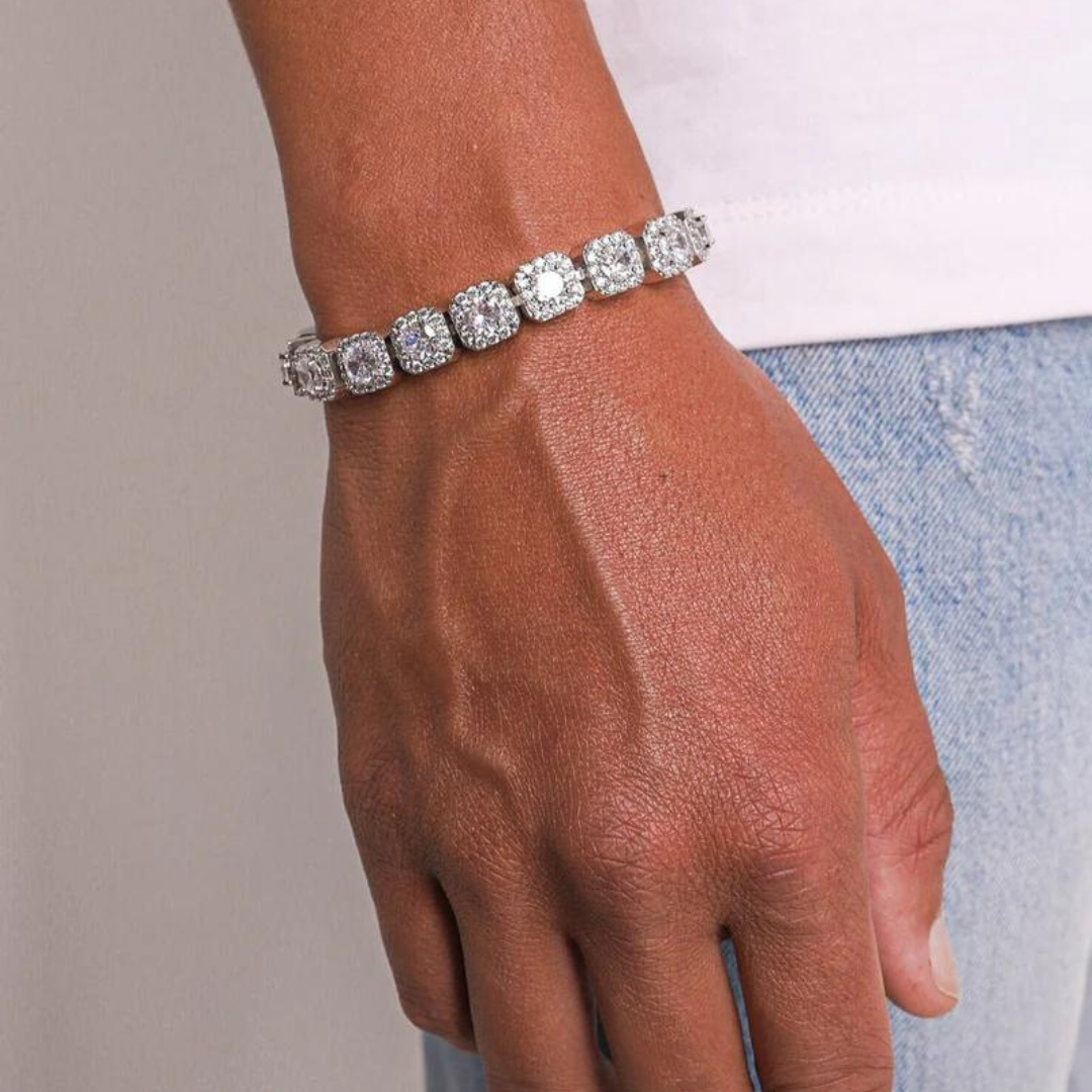 Men's model showcasing the Clustered Bracelet in White Gold, highlighting its distinctive design and elegant clustered stones for a stylish and refined accessory.