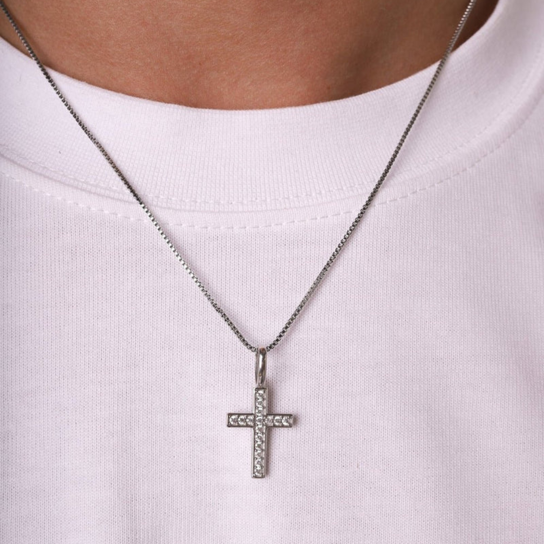 Men's model showcasing the Divine Cross Pendant in 925 Sterling Silver with a White Gold finish, embodying a sophisticated and luxurious hip hop style.