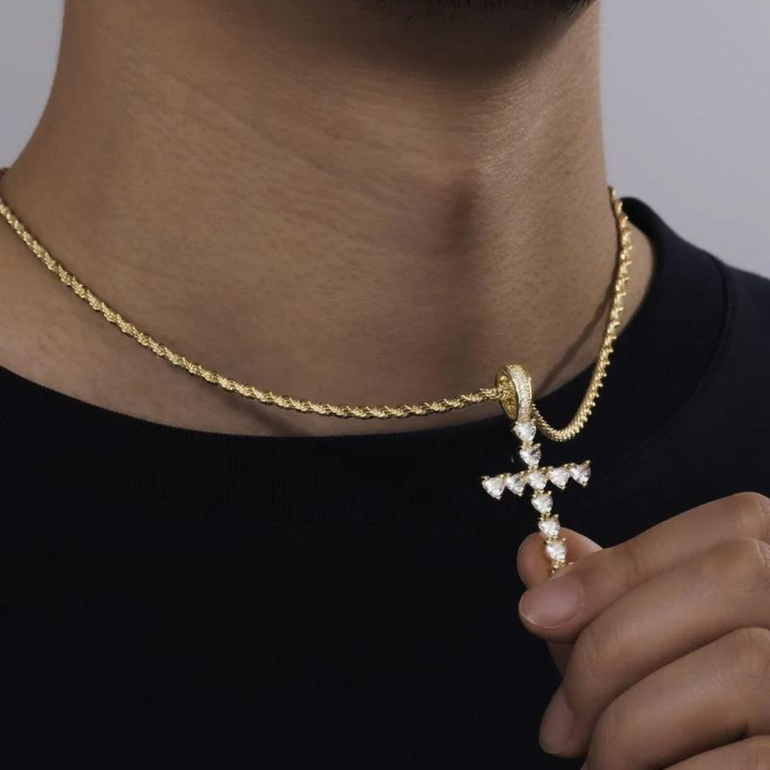 Men's model showcasing the Heart Cross Pendant in 18K Gold, highlighting a sophisticated and meaningful accessory with a blend of heart and cross designs.