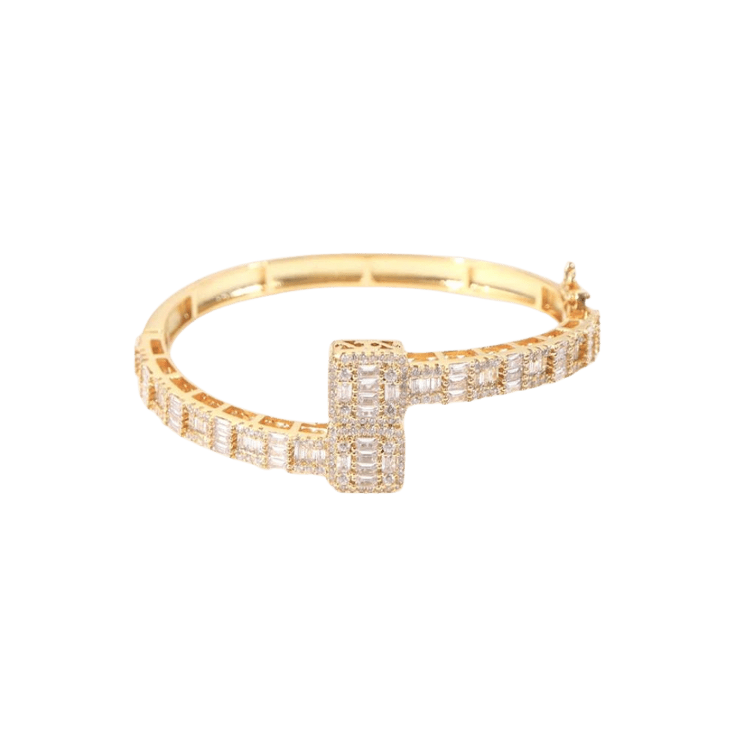 Luxurious Iced Bangle Bracelet crafted from 14K Gold, featuring exquisite detailing and brilliant gemstone embellishments for a high-end, eye-catching design.