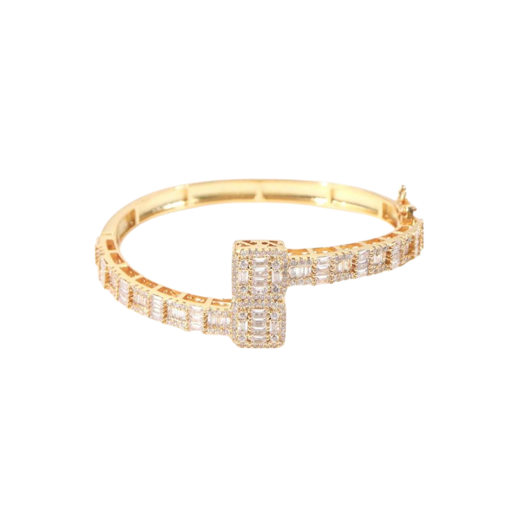 Luxurious Iced Bangle Bracelet crafted from 14K Gold, featuring exquisite detailing and brilliant gemstone embellishments for a high-end, eye-catching design.