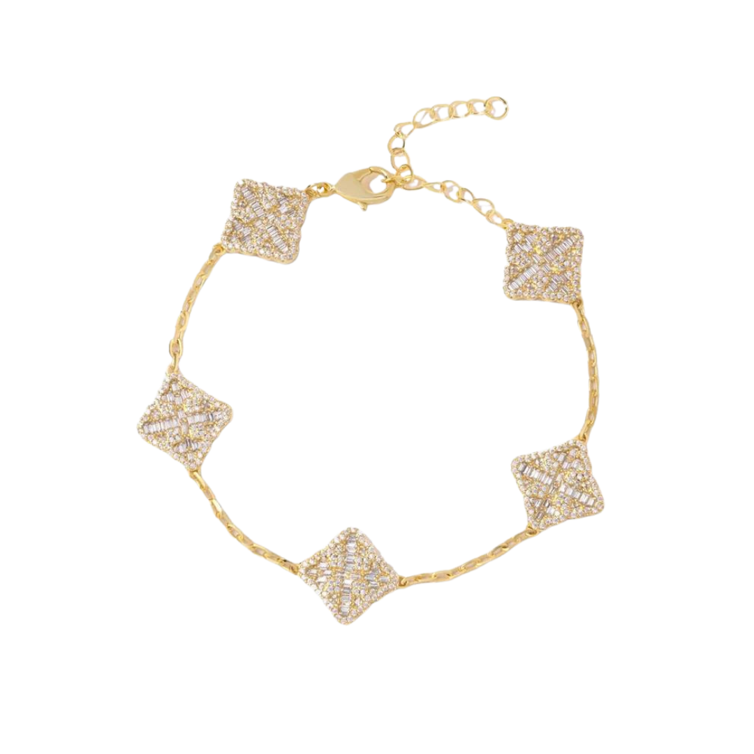 Exquisite Iced Clover Bracelet crafted in 18K Gold, featuring a unique clover design with brilliant gemstone embellishments for a luxurious and eye-catching accessory.