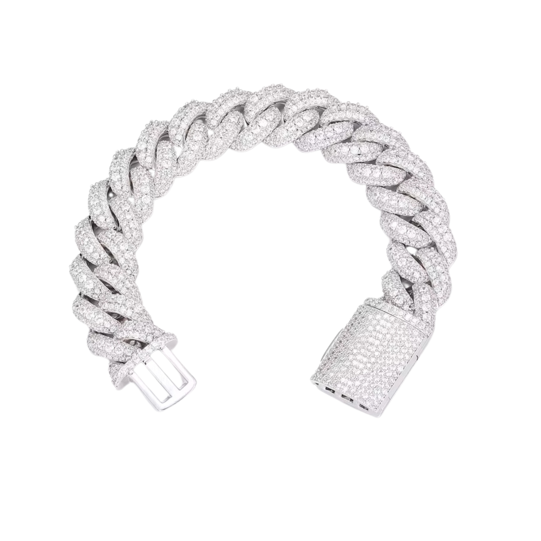 Bold Iced Cuban Link Bracelet crafted in White Gold with 18MM links, featuring intricate detailing and dazzling gemstones for an extravagant and eye-catching design.