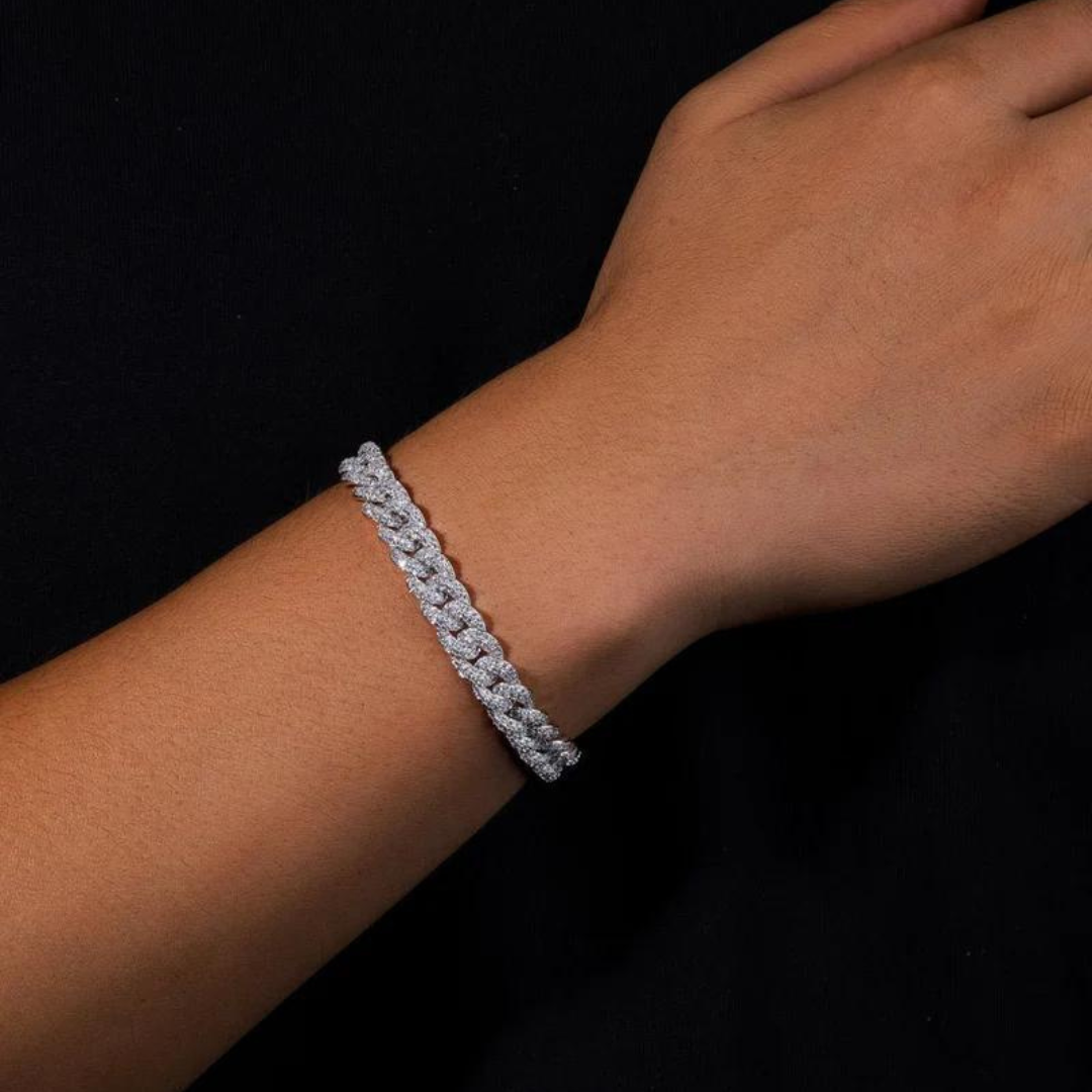 Men's model showcasing the Iced Cuban Link Bracelet in White Gold with 8MM links, featuring a stylish design with dazzling gemstones for a sophisticated and refined accessory.