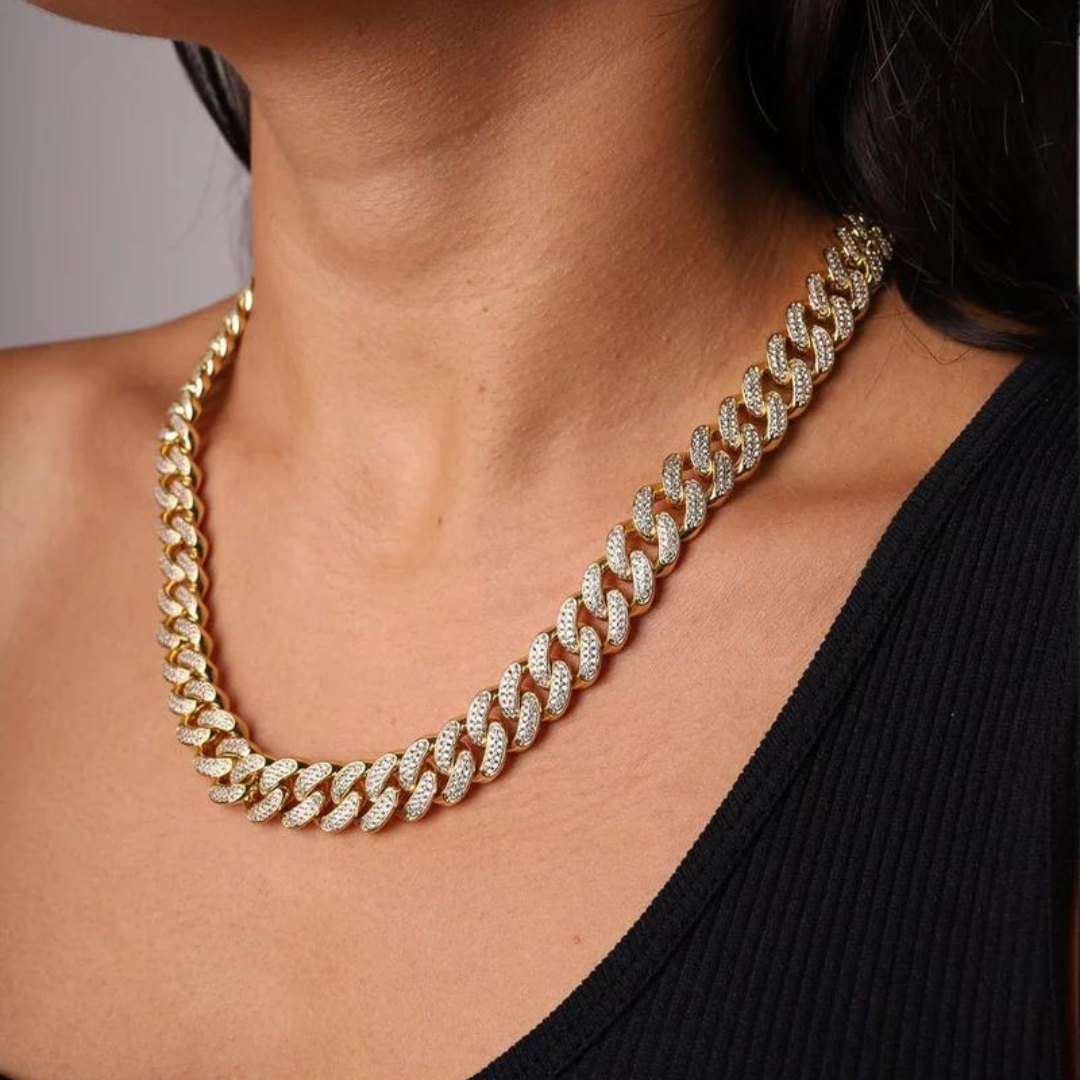 Women's model showcasing the Iced Cuban Link Chain in 18K Gold with 10MM links from an alternative perspective, highlighting the luxurious design and sparkling gemstones for a refined and stylish appearance.