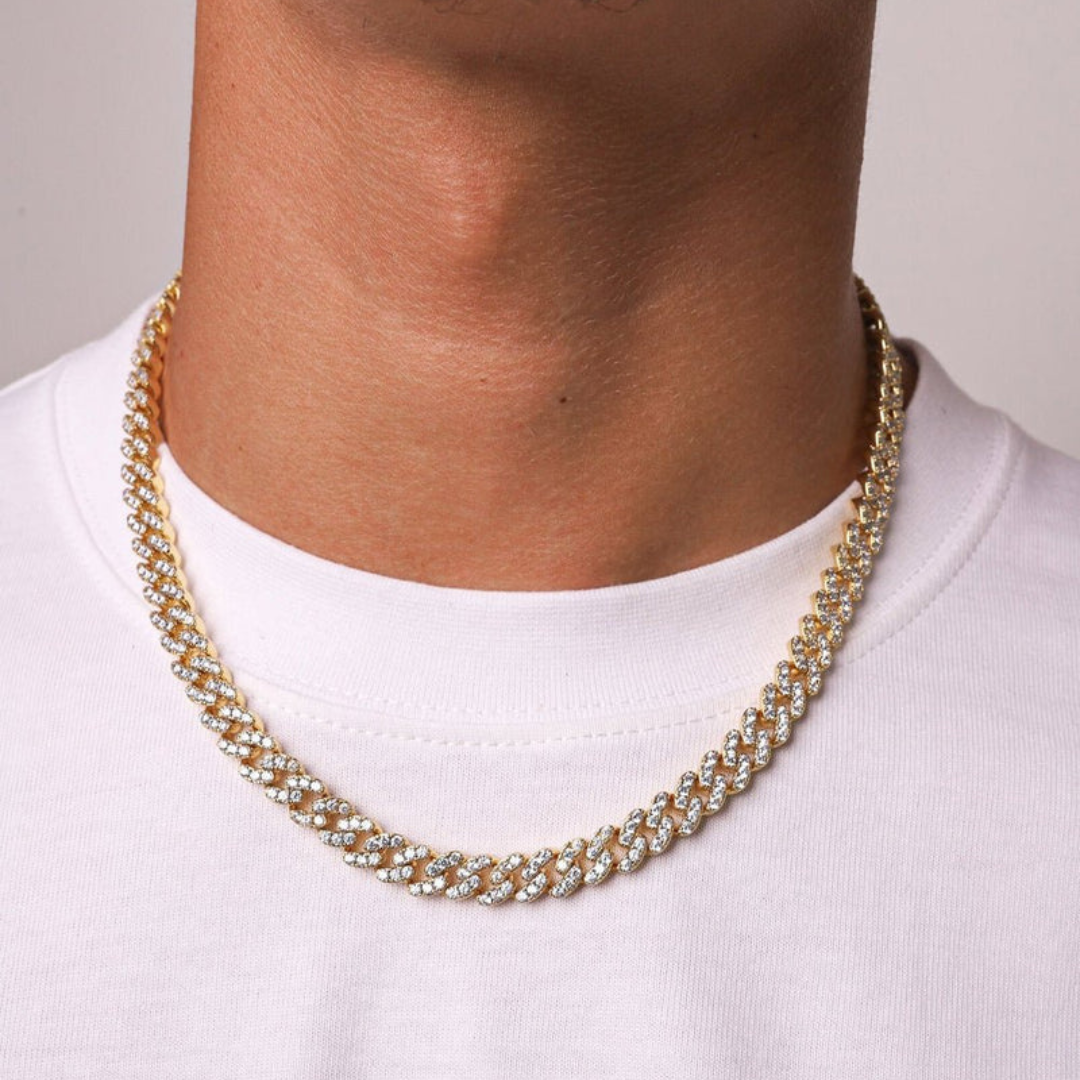 Men's model showcasing the Iced Cuban Link Chain in 18K Gold with 8MM links, featuring a stylish design with dazzling gemstones for a sophisticated and high-impact accessory.