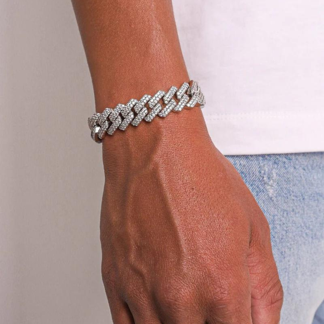 Men's model showcasing the Iced Prong Bracelet in White Gold with 13MM links, featuring a bold design with prong-set sparkling gemstones for a refined and impactful accessory.