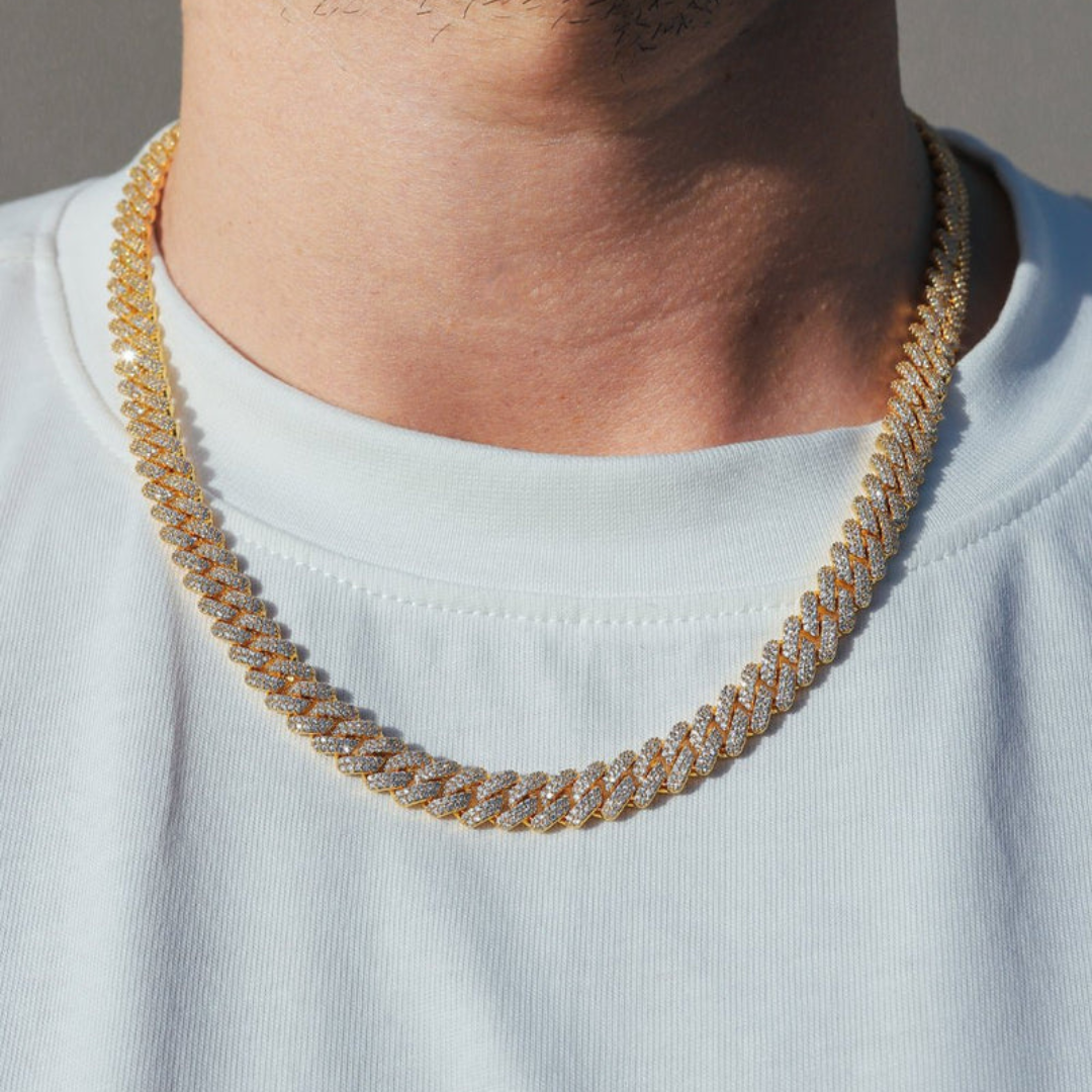 Men's model showcasing the Iced Prong Chain in 18K Gold with 9MM links, featuring a refined design with prong-set sparkling gemstones for a high-impact and elegant accessory.