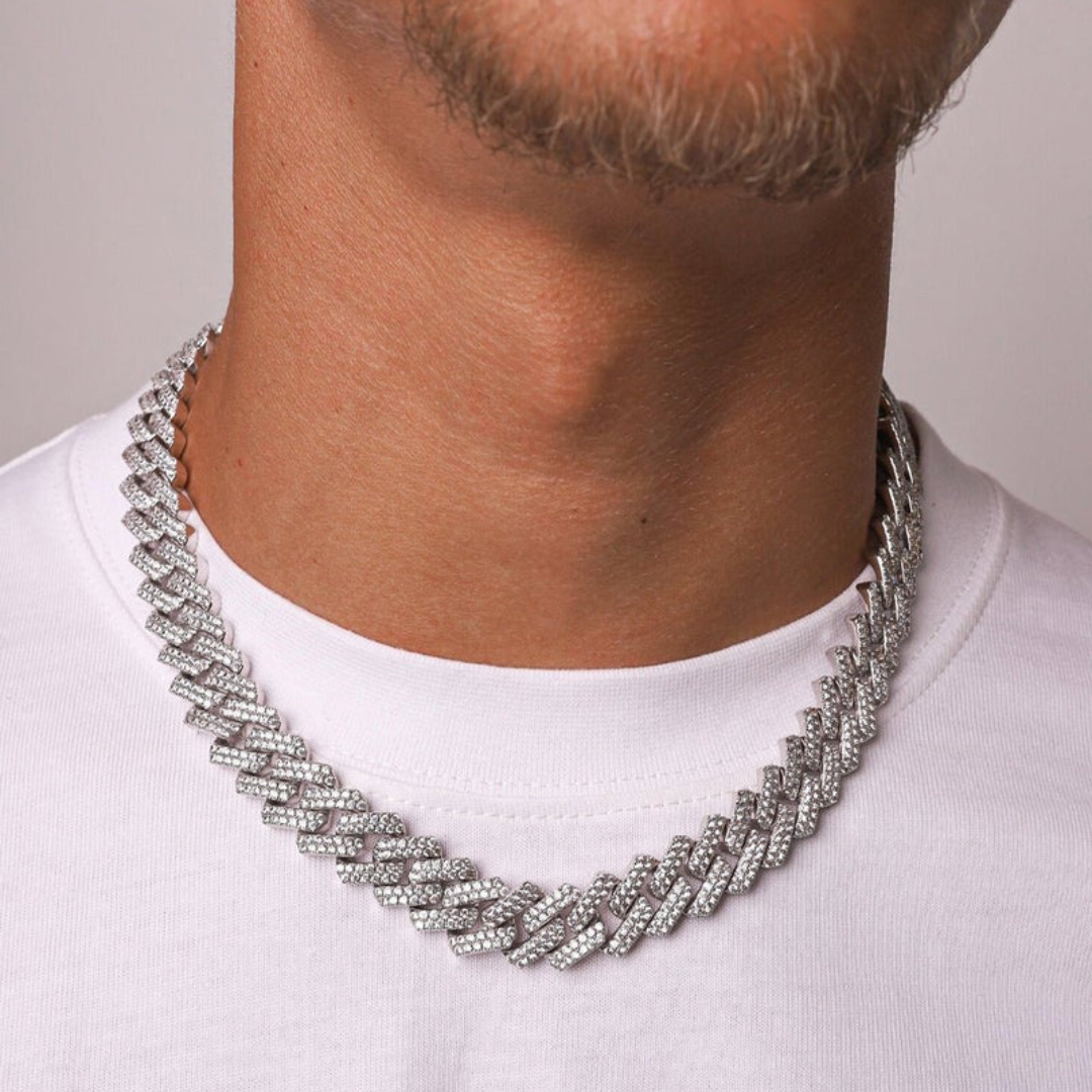 Men's model showcasing the Iced Prong Chain in White Gold with 13MM links, featuring a striking design with prong-set sparkling gemstones for a high-impact and refined accessory.