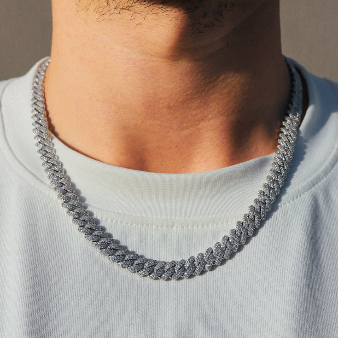 Men's model showcasing the Iced Prong Chain in White Gold with 9MM links, featuring a refined design with prong-set sparkling gemstones for a high-impact and elegant accessory.