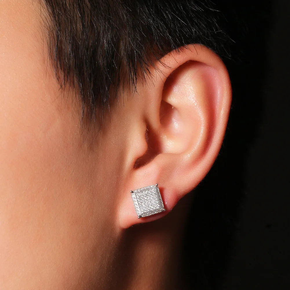 Men's model showcasing the Iced Square Earrings in 925 Sterling Silver with a White Gold finish, featuring a refined design with prong-set gemstones for a bold and luxurious look.