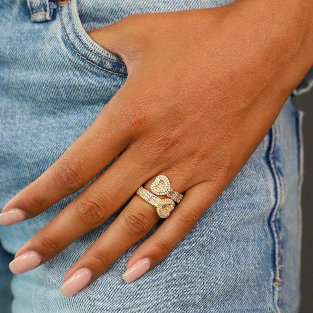 Women's model wearing the Love Ring in 18K Gold, highlighting its elegant design and opulent finish for a stylish and sophisticated look.