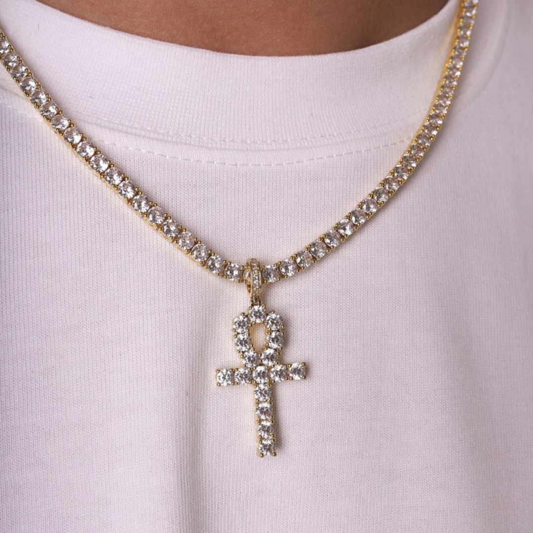 Model wearing 18K gold Ankh Pendant, side view, highlighting detailed craftsmanship and elegance.