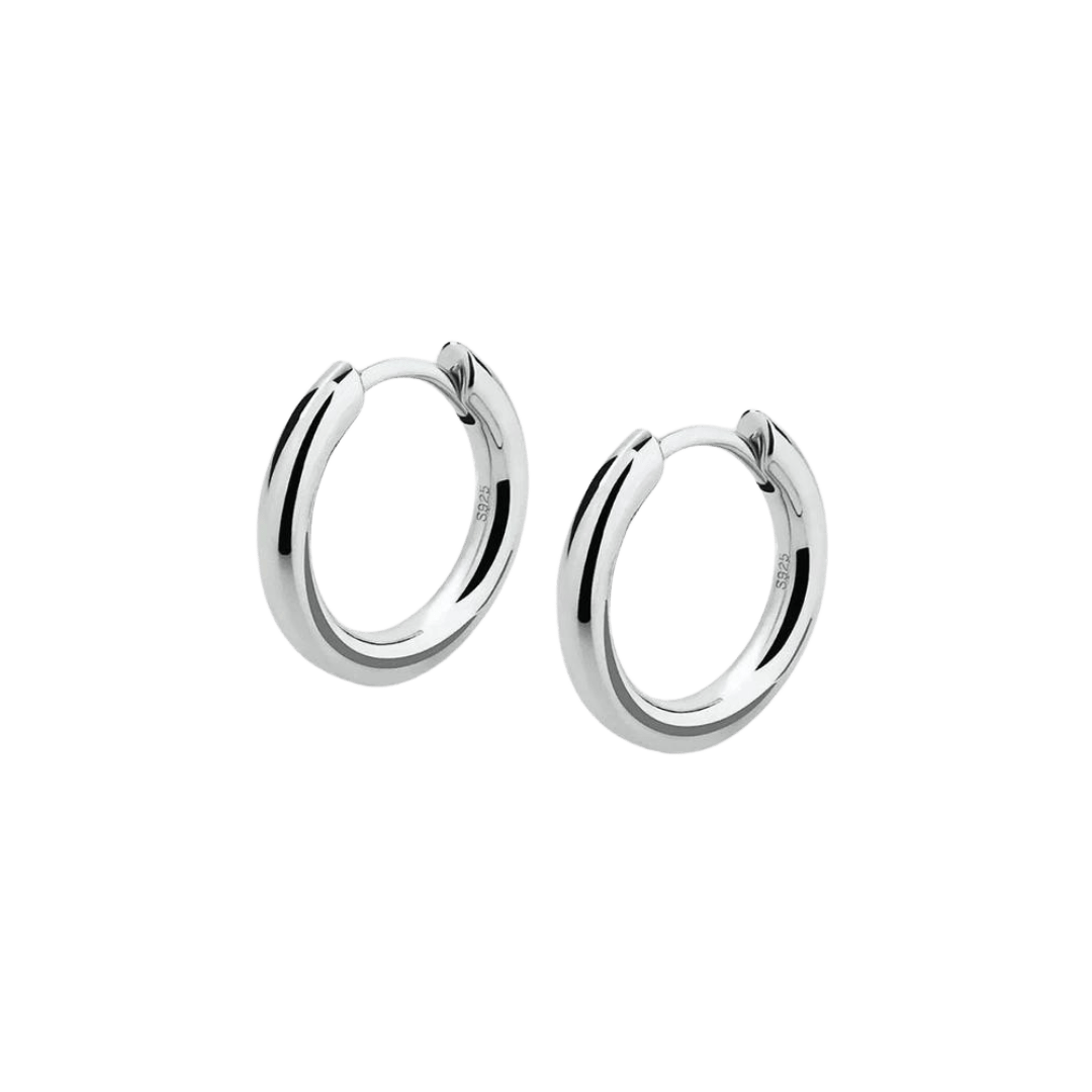 Classic Solid Hoop Earrings crafted from 925 Sterling Silver and finished in White Gold. Featuring a timeless design and luxurious finish for an elegant and refined accessory.