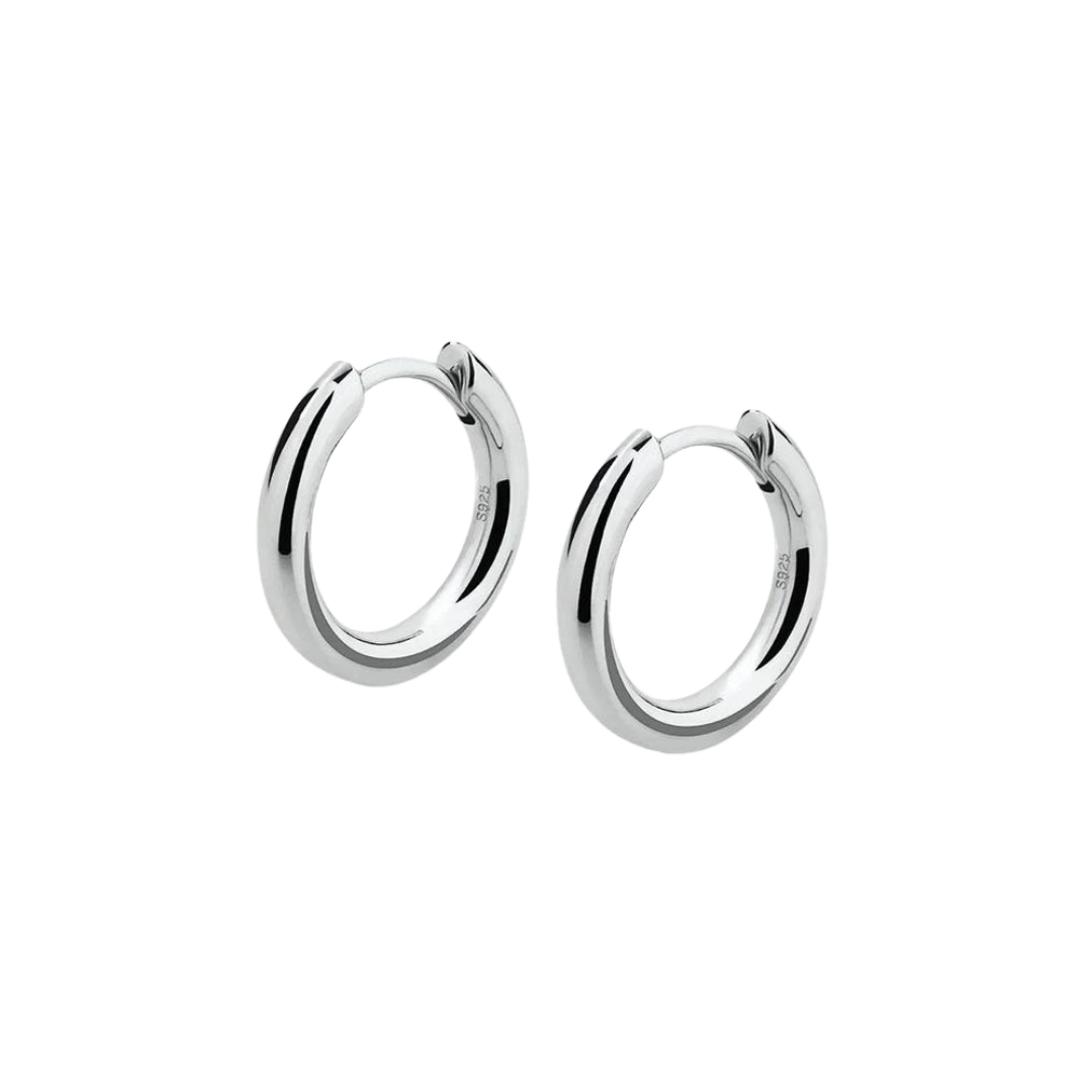 Classic Solid Hoop Earrings crafted from 925 Sterling Silver and finished in White Gold. Featuring a timeless design and luxurious finish for an elegant and refined accessory.