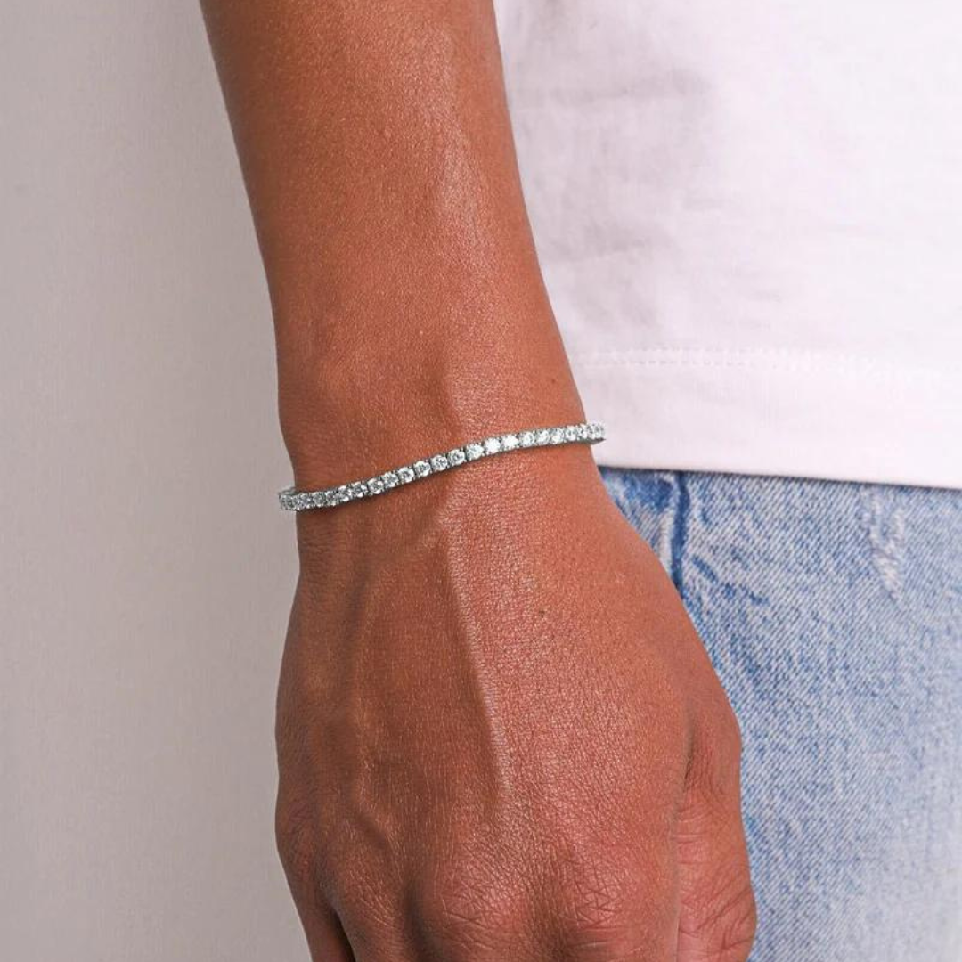 Men's model showcasing the Tennis Bracelet in White Gold with 3MM links, highlighting its classic design and luxurious finish for a stylish and sophisticated accessory.