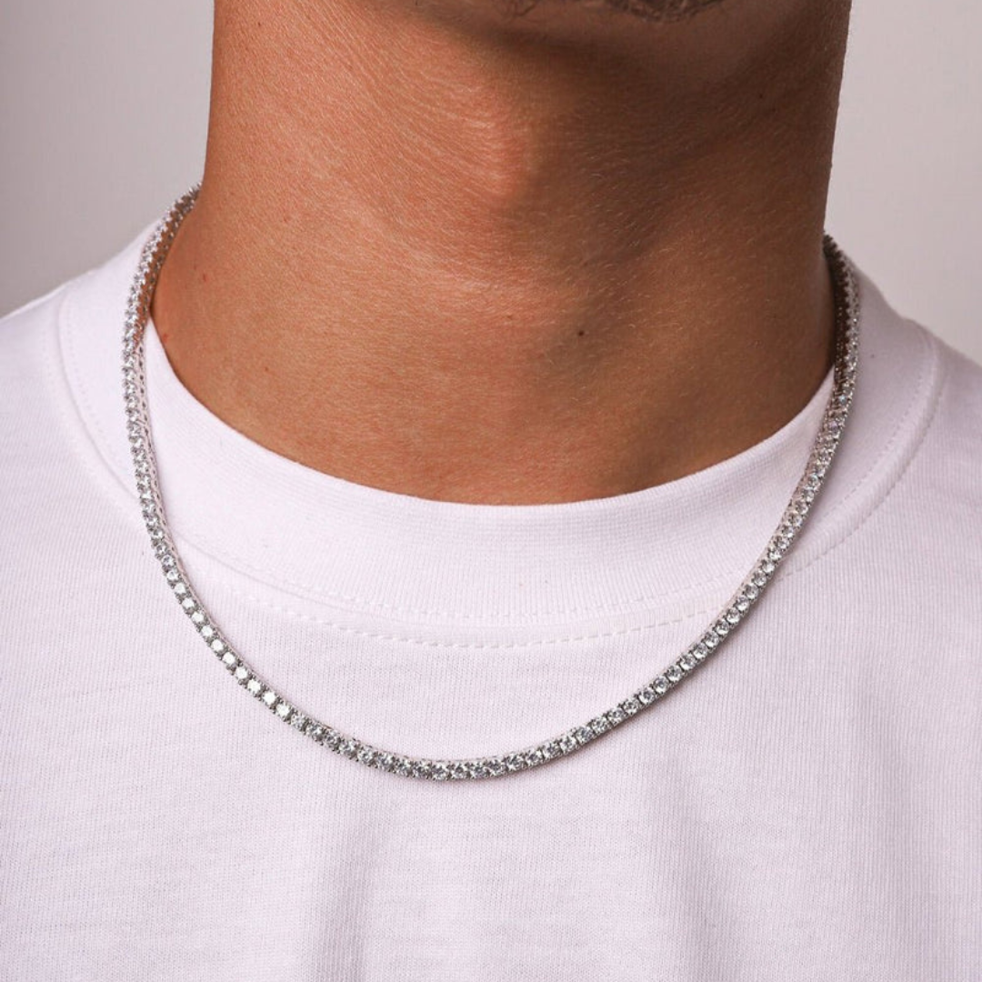 Men's model showcasing the Tennis Chain in White Gold with 3MM links, highlighting its sleek and stylish design for a high-impact accessory that exudes luxury.