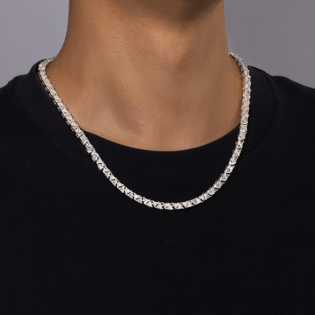 Men's model showcasing the Triangle Tennis Chain in White Gold with 5MM links, highlighting its distinctive triangular design for a bold and refined accessory that exudes luxury and style.