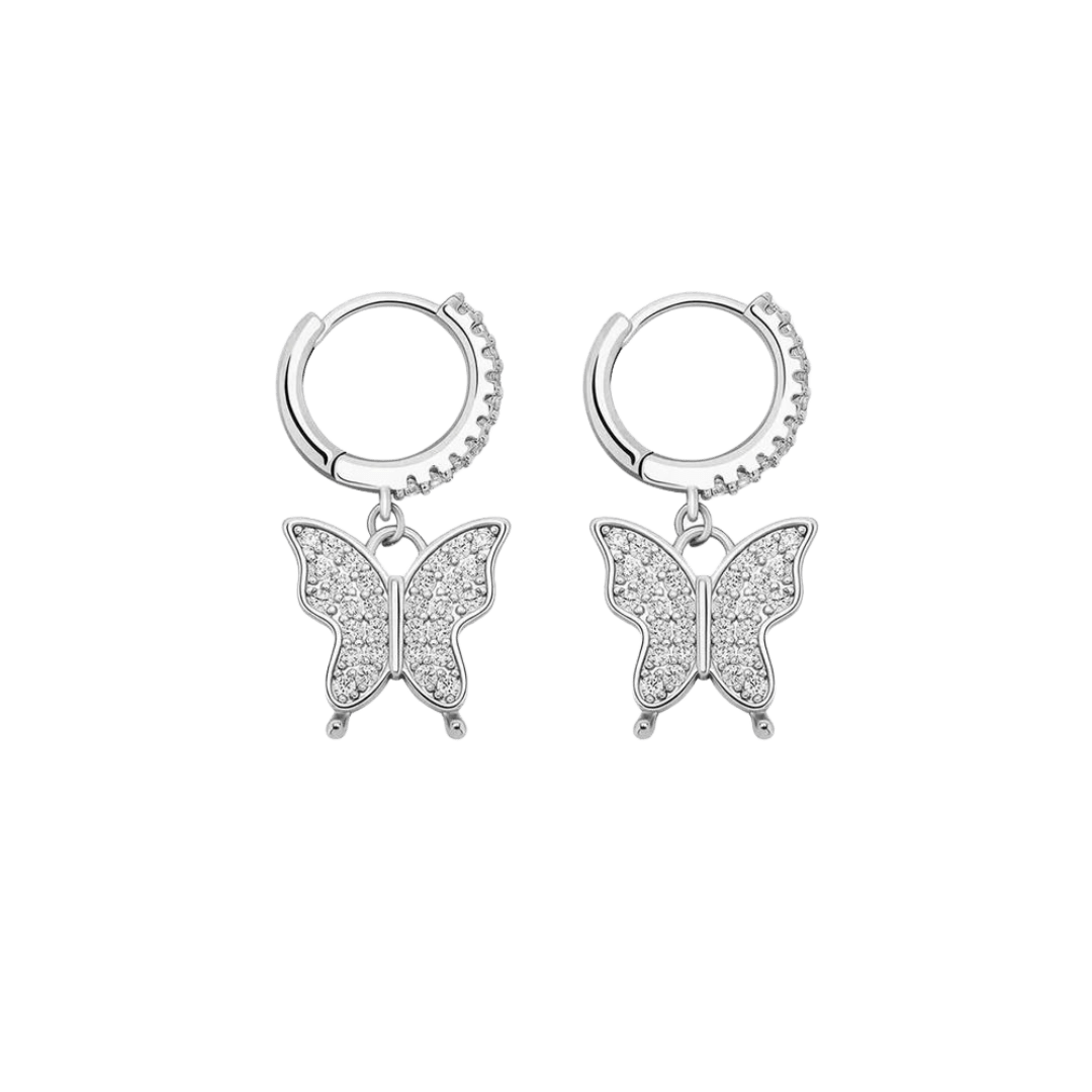 White gold butterfly earrings with finely detailed, polished wings, capturing light with their elegant and delicate design.