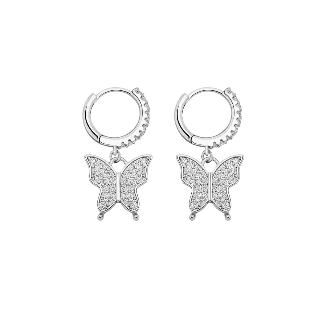 White gold butterfly earrings with finely detailed, polished wings, capturing light with their elegant and delicate design.