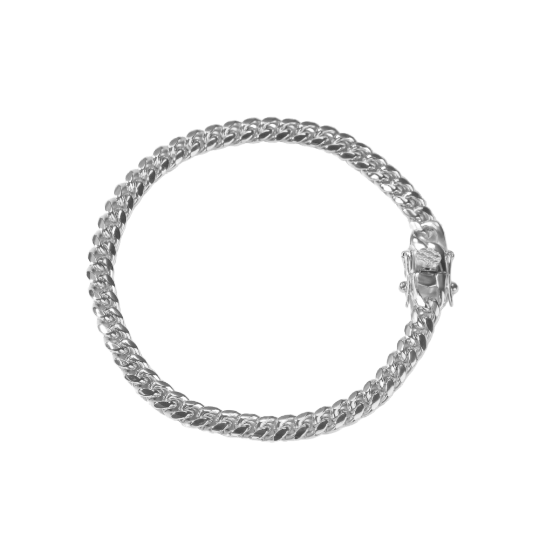 White gold Cuban link bracelet with a 6mm width, featuring interlinked segments that offer a balanced and refined look with a polished finish.