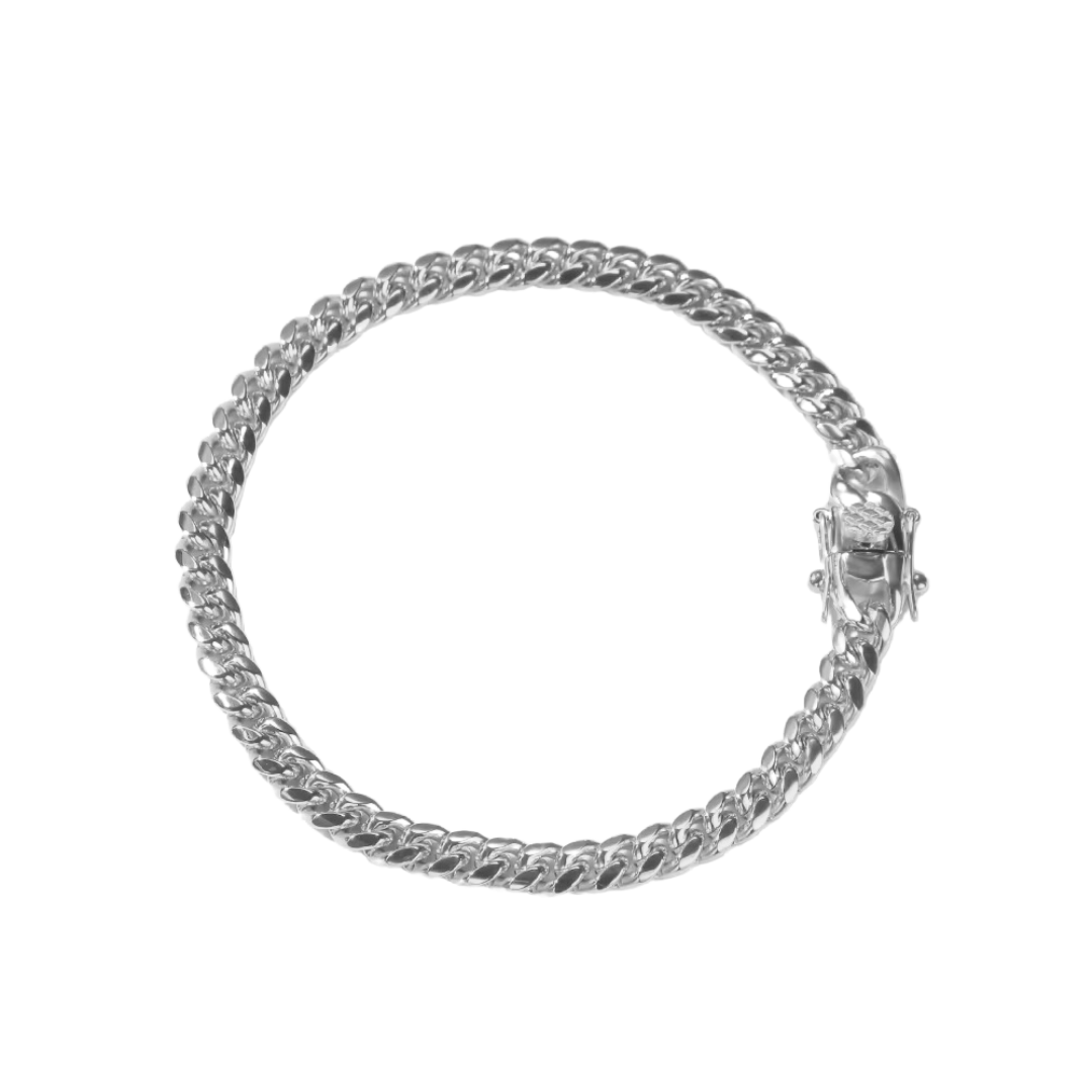 White gold Cuban link bracelet with a 6mm width, featuring interlinked segments that offer a balanced and refined look with a polished finish.