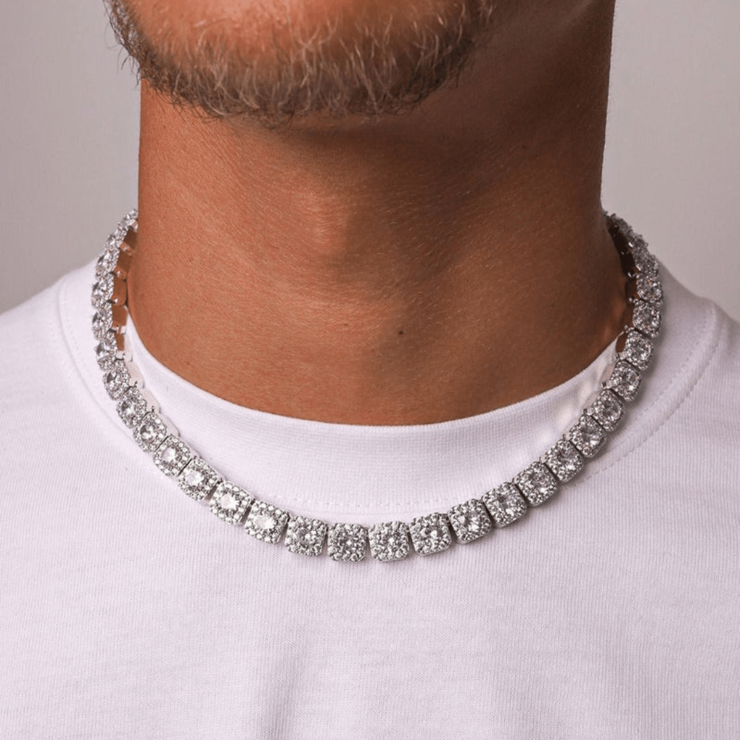 Model wearing a white gold clustered chain with a 10mm width, showcasing its bold design and elegant shine against a fashionable outfit.